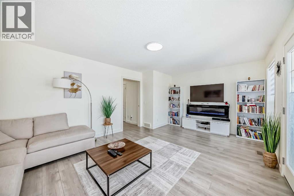 437 Auburn Bay Drive Se, Calgary, AB - Indoor Photo Showing Living Room