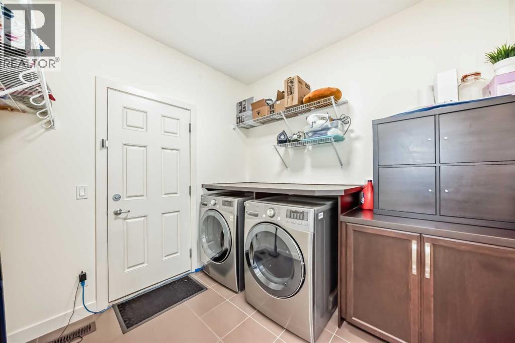 437 Auburn Bay Drive Se, Calgary, AB - Indoor Photo Showing Laundry Room
