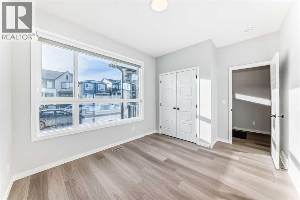 32 Creekview Common Sw, Calgary, AB - Indoor Photo Showing Other Room