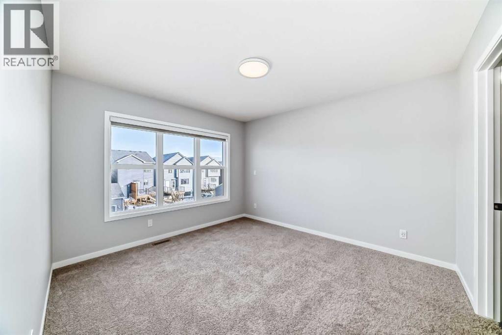 32 Creekview Common Sw, Calgary, AB - Indoor Photo Showing Other Room