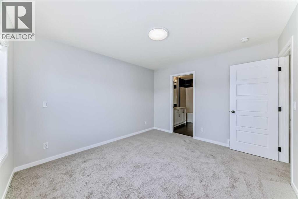 32 Creekview Common Sw, Calgary, AB - Indoor Photo Showing Other Room