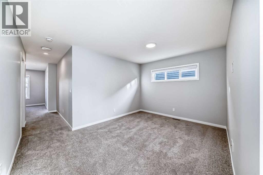 32 Creekview Common Sw, Calgary, AB - Indoor Photo Showing Other Room