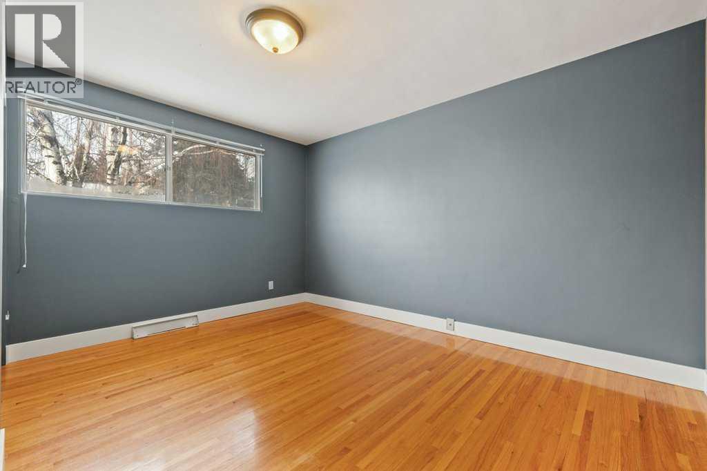 2719 Chalice Road Nw, Calgary, AB - Indoor Photo Showing Other Room