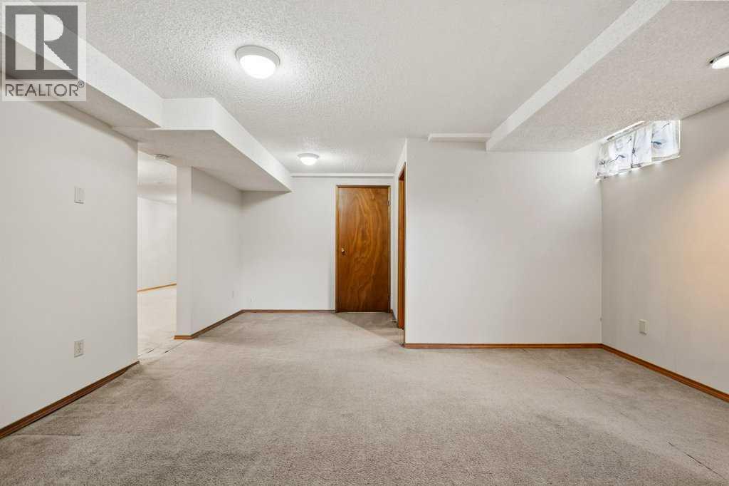 2719 Chalice Road Nw, Calgary, AB - Indoor Photo Showing Other Room