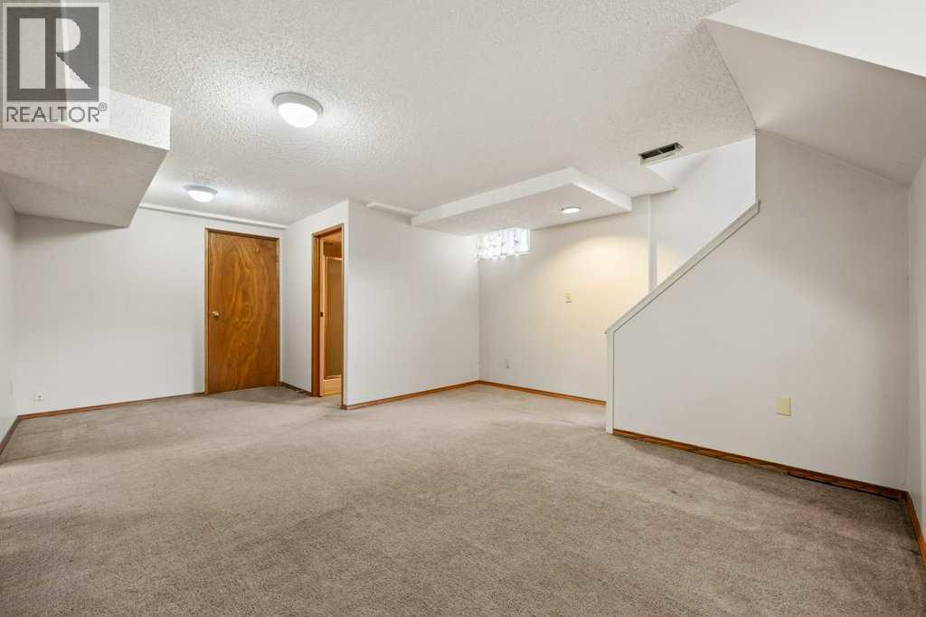 2719 Chalice Road Nw, Calgary, AB - Indoor Photo Showing Other Room