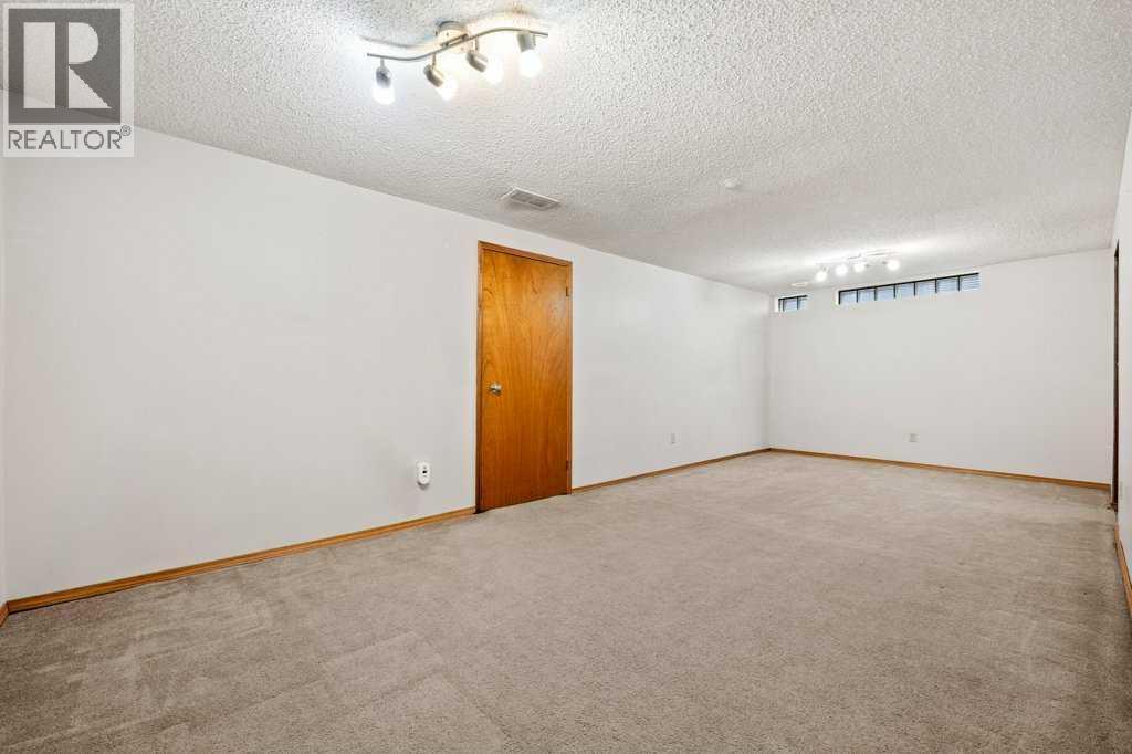 2719 Chalice Road Nw, Calgary, AB - Indoor Photo Showing Other Room