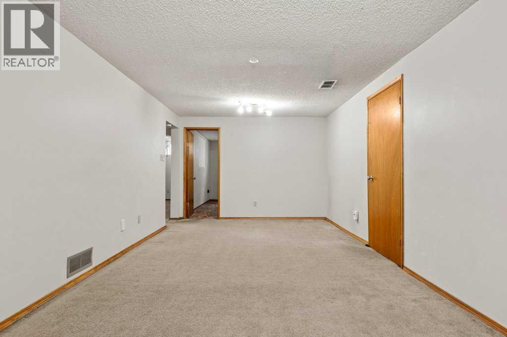 2719 Chalice Road Nw, Calgary, AB - Indoor Photo Showing Other Room