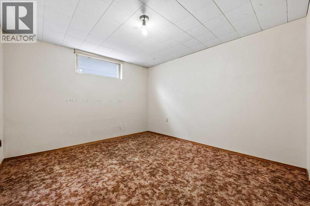 2719 Chalice Road Nw, Calgary, AB - Indoor Photo Showing Other Room