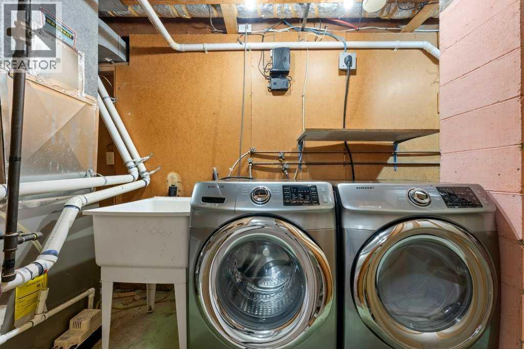2719 Chalice Road Nw, Calgary, AB - Indoor Photo Showing Laundry Room