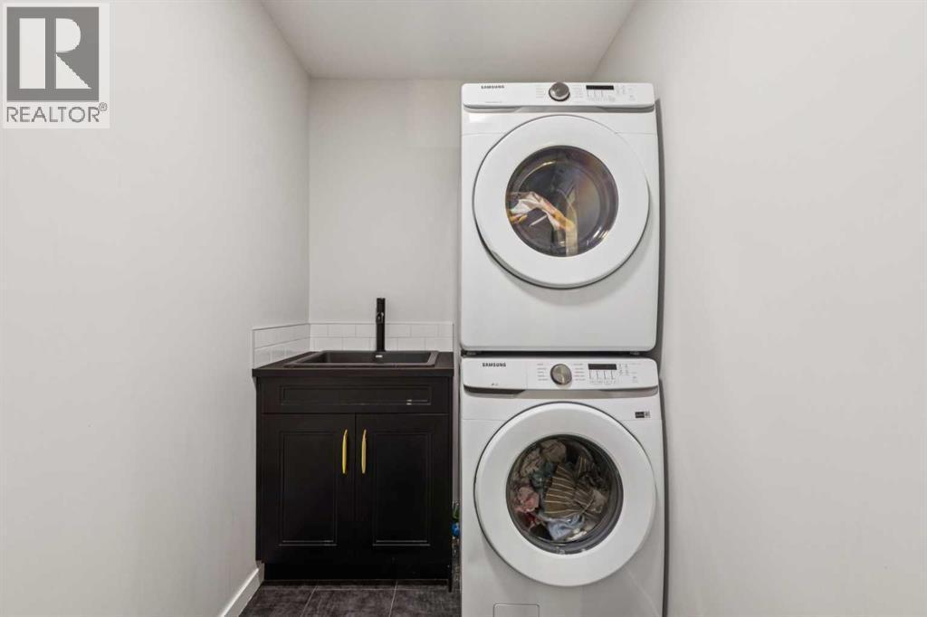 86 Creekside Way Sw, Calgary, AB - Indoor Photo Showing Laundry Room