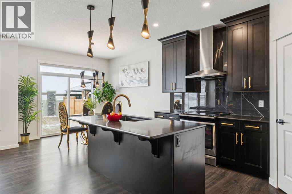 86 Creekside Way Sw, Calgary, AB - Indoor Photo Showing Kitchen With Upgraded Kitchen