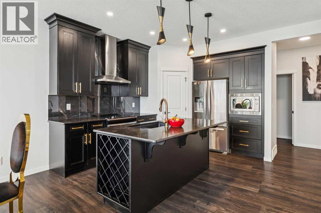 86 Creekside Way Sw, Calgary, AB - Indoor Photo Showing Kitchen With Stainless Steel Kitchen With Upgraded Kitchen