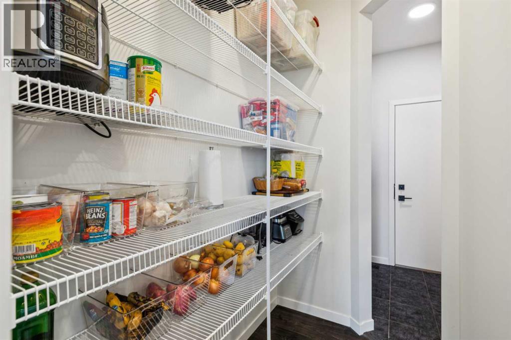 86 Creekside Way Sw, Calgary, AB - Indoor With Storage