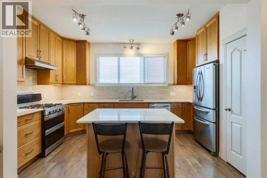 123 Marquis Green Se, Calgary, AB - Indoor Photo Showing Kitchen With Upgraded Kitchen