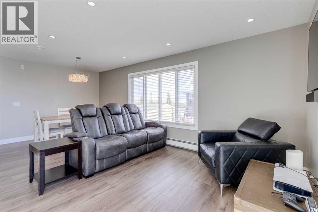 123 Marquis Green Se, Calgary, AB - Indoor Photo Showing Living Room
