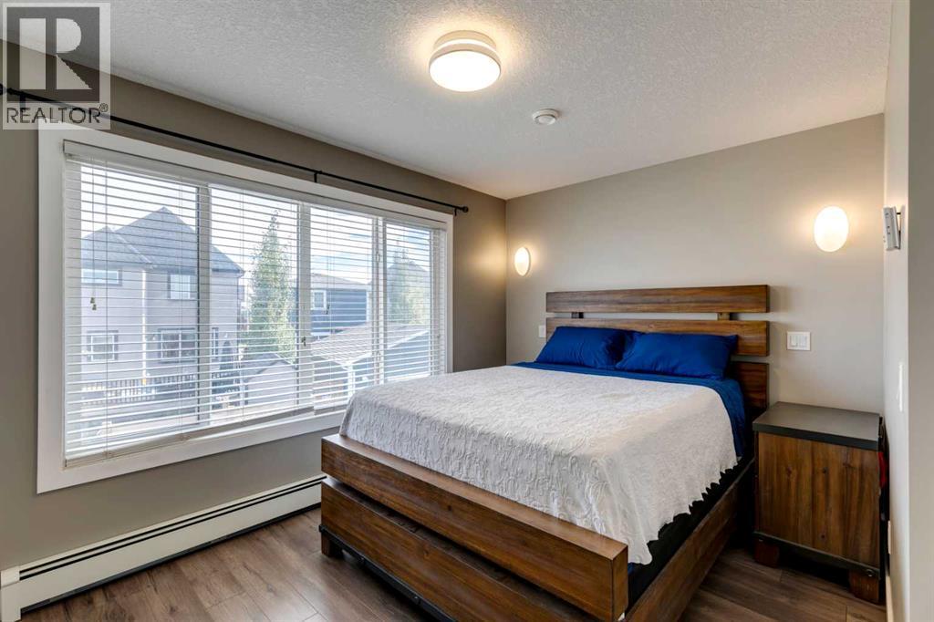 123 Marquis Green Se, Calgary, AB - Indoor Photo Showing Bedroom