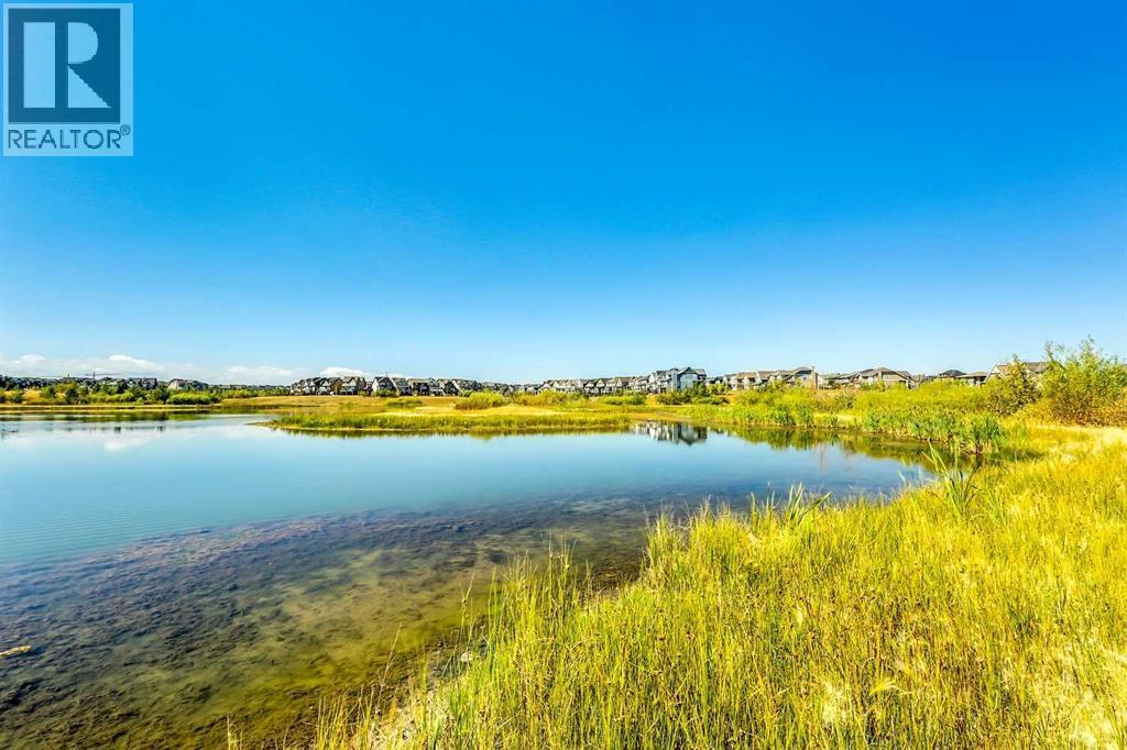 123 Marquis Green Se, Calgary, AB - Outdoor With Body Of Water With View