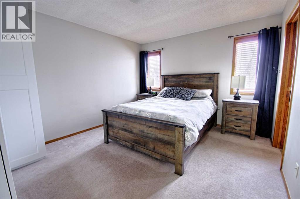 46 Heritage Crescent W, Lethbridge, AB - Indoor Photo Showing Bedroom