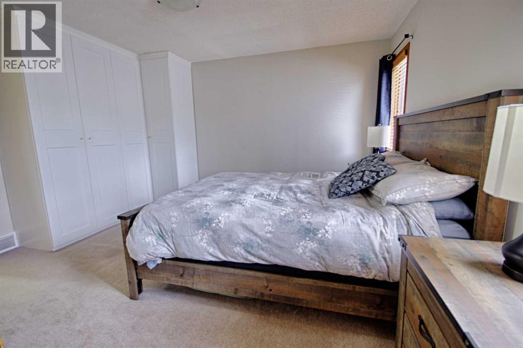 46 Heritage Crescent W, Lethbridge, AB - Indoor Photo Showing Bedroom