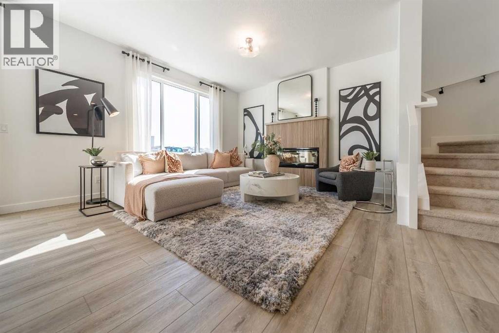 211 Langwell Common Se, Airdrie, AB - Indoor Photo Showing Living Room