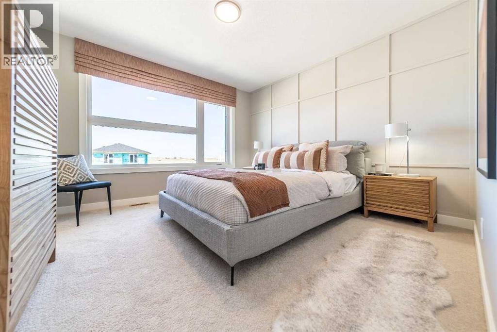 211 Langwell Common Se, Airdrie, AB - Indoor Photo Showing Bedroom