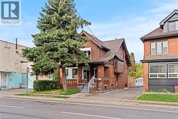 View of front of house with brick siding -