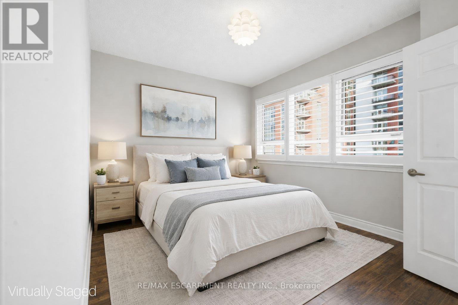 VIRTUALLY STAGED - 610 - 399 Elizabeth Street, Burlington, ON - Indoor Photo Showing Bedroom