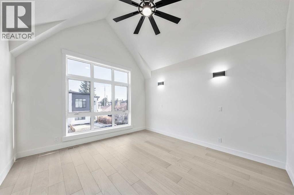 Impressive cathedral ceiling feature in primary bedroom - 1417 42 Street Sw, Calgary, AB - Indoor Photo Showing Other Room