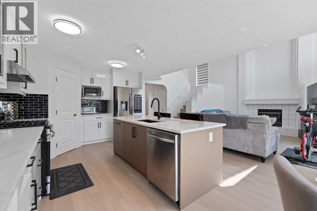 Kitchen - 7 Country Hills Park Nw, Calgary, AB - Indoor Photo Showing Kitchen With Stainless Steel Kitchen With Upgraded Kitchen