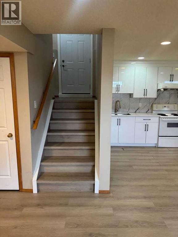Basement - 7 Country Hills Park Nw, Calgary, AB - Indoor Photo Showing Kitchen