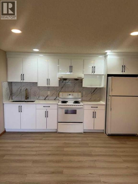 Basement - 7 Country Hills Park Nw, Calgary, AB - Indoor Photo Showing Kitchen