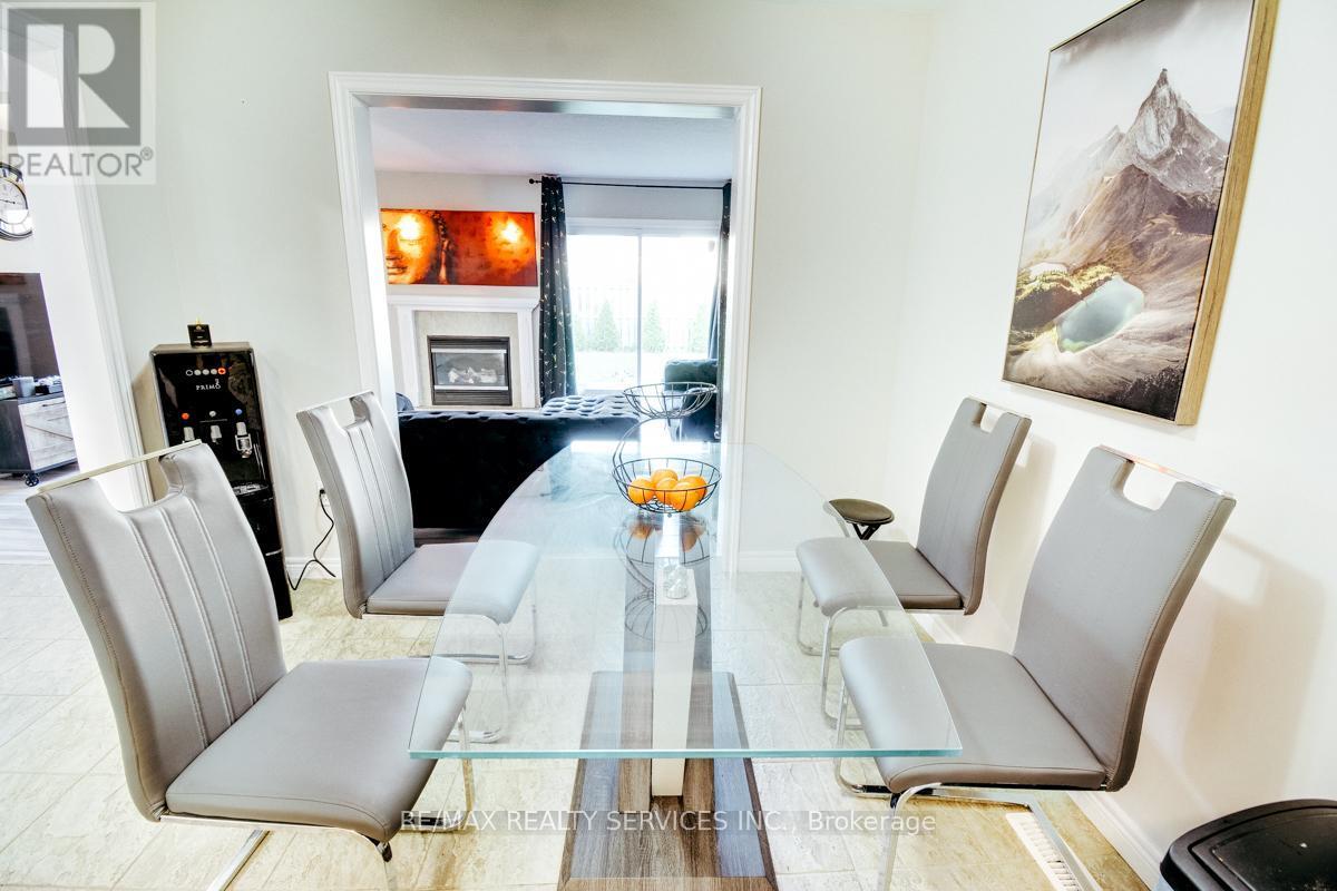 21 Faith Boulevard, St. Thomas, ON - Indoor Photo Showing Dining Room With Fireplace