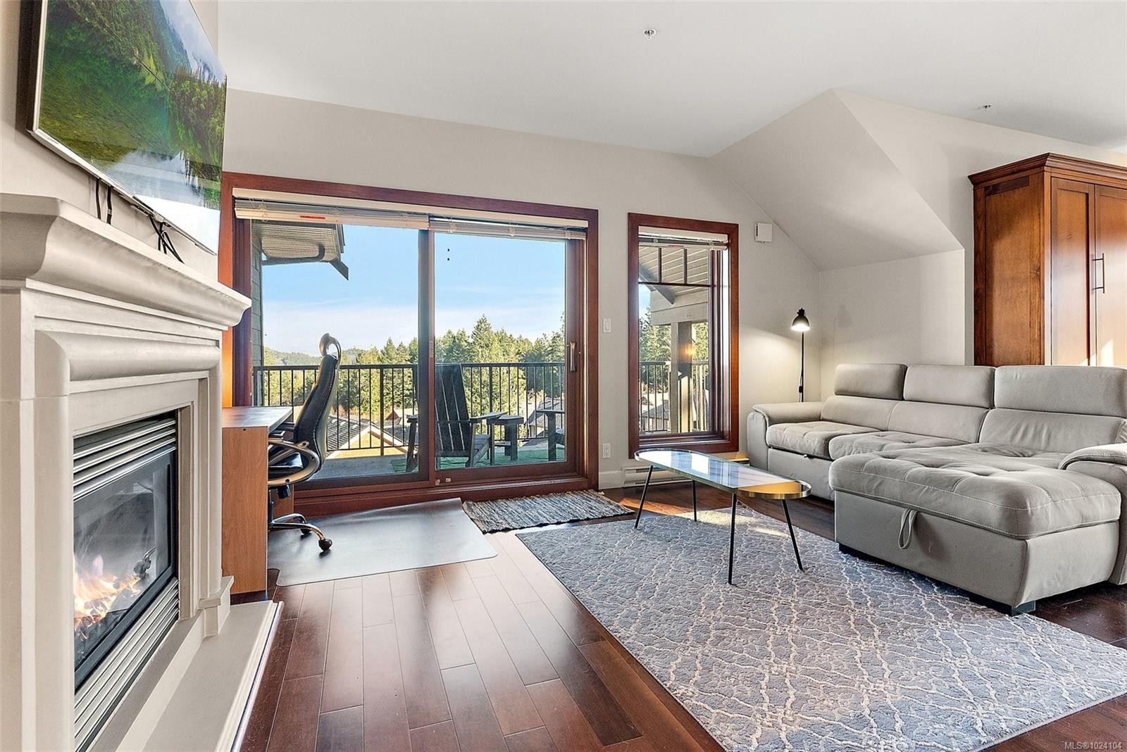407-2006 Troon Crt, Langford, BC - Indoor Photo Showing Living Room With Fireplace
