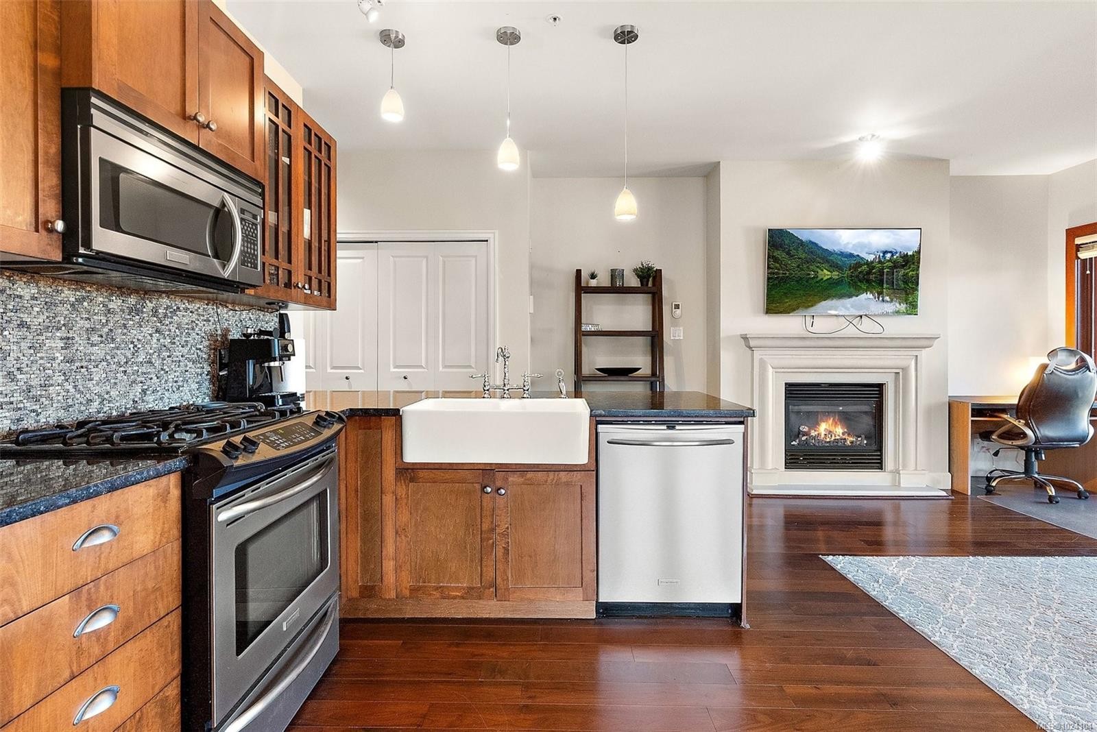 407-2006 Troon Crt, Langford, BC - Indoor Photo Showing Kitchen With Fireplace With Upgraded Kitchen