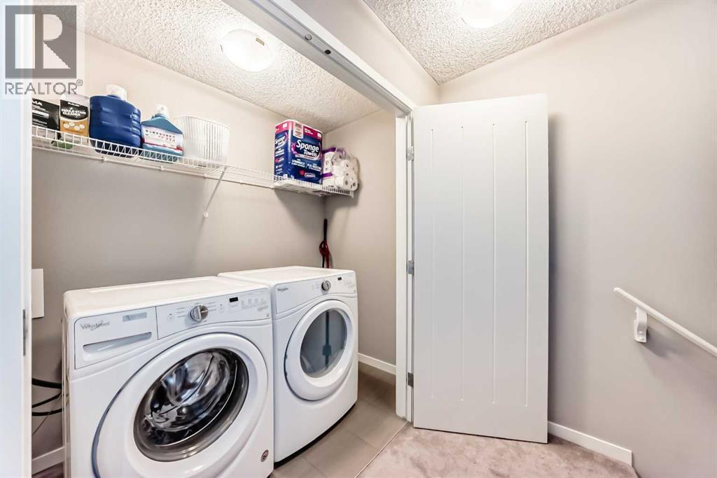 309 Nolanlake Villas Nw, Calgary, AB - Indoor Photo Showing Laundry Room