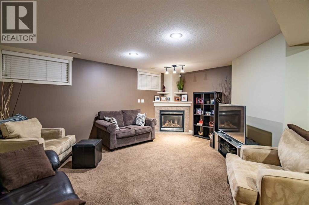 261 Jenner Crescent, Red Deer, AB - Indoor With Fireplace