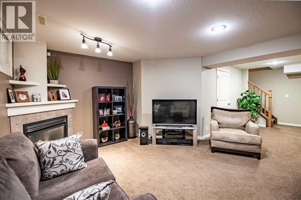 261 Jenner Crescent, Red Deer, AB - Indoor With Fireplace