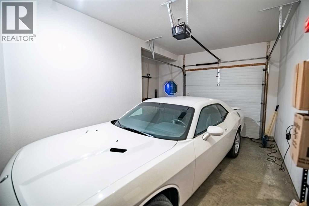 261 Jenner Crescent, Red Deer, AB - Indoor Photo Showing Garage