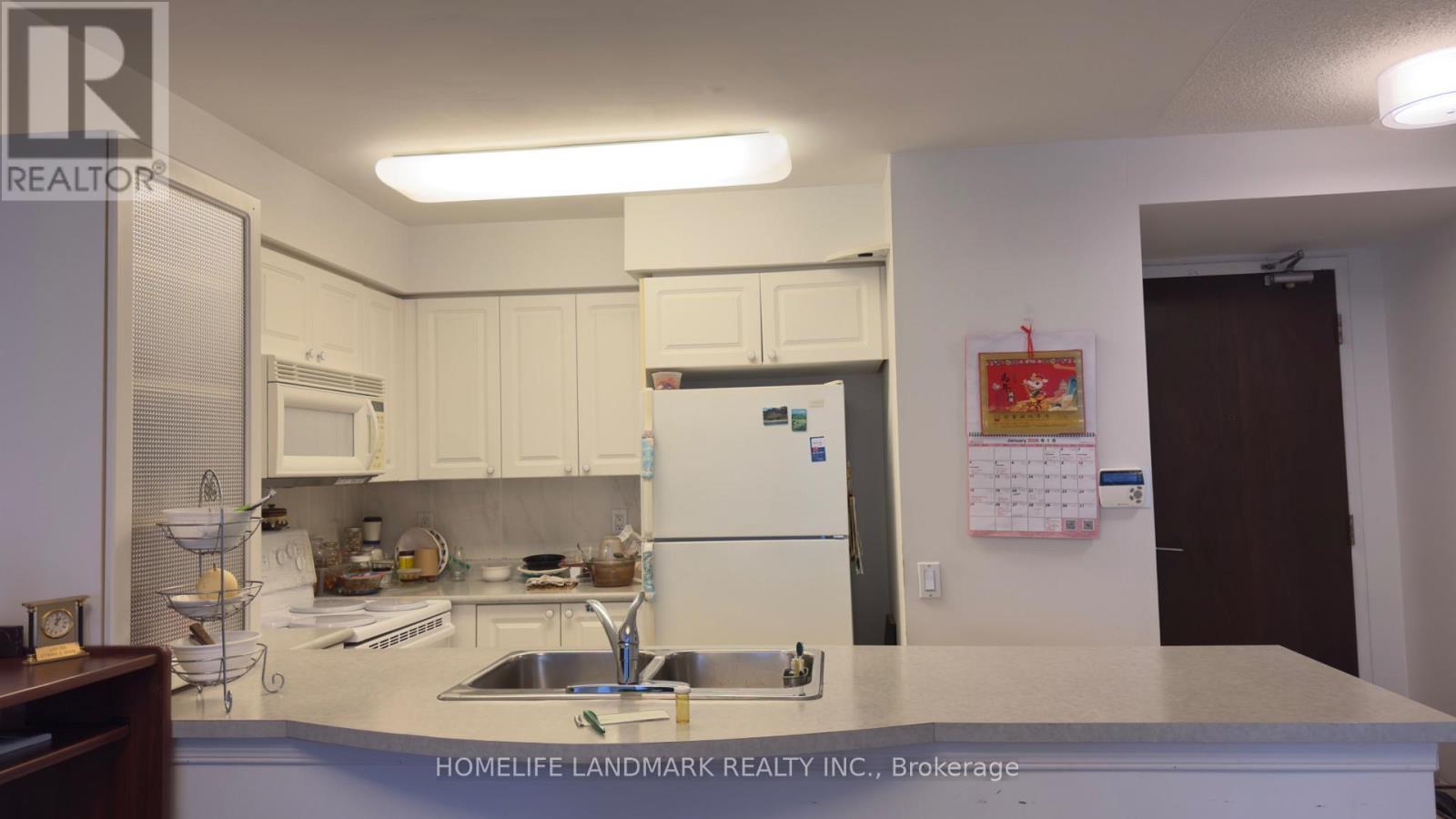 807 - 388 Bloor Street E, Toronto, ON - Indoor Photo Showing Kitchen With Double Sink