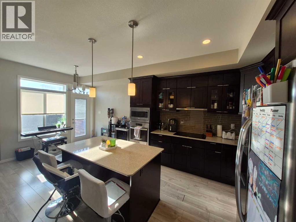 Kitchen - 5, 438 Highlands Boulevard W, Lethbridge, AB - Indoor Photo Showing Other Room