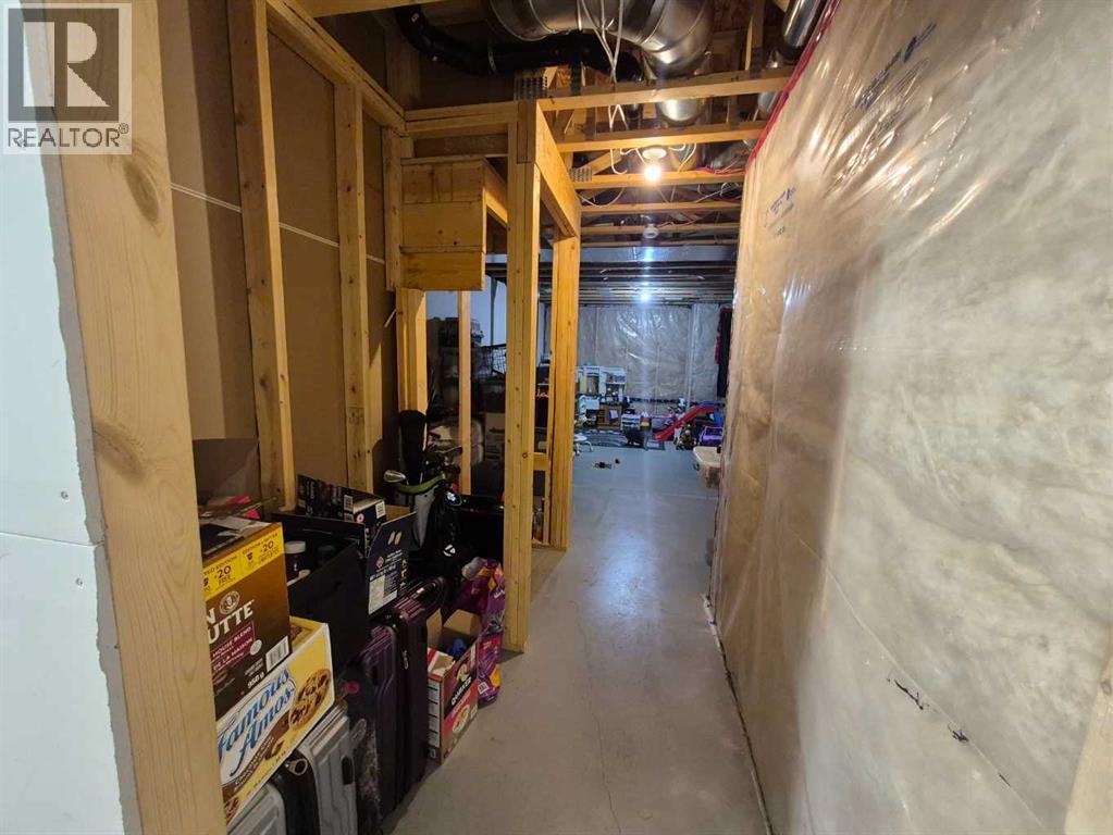 Entry hallway into basement - 5, 438 Highlands Boulevard W, Lethbridge, AB - Indoor