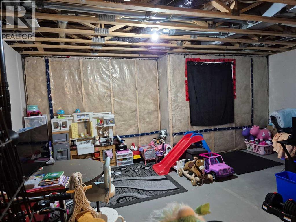 5, 438 Highlands Boulevard W, Lethbridge, AB - Indoor Photo Showing Basement