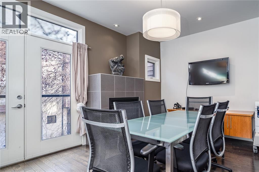 boardroom/family room - 1029 1 Avenue Ne, Calgary, AB - Indoor Photo Showing Dining Room