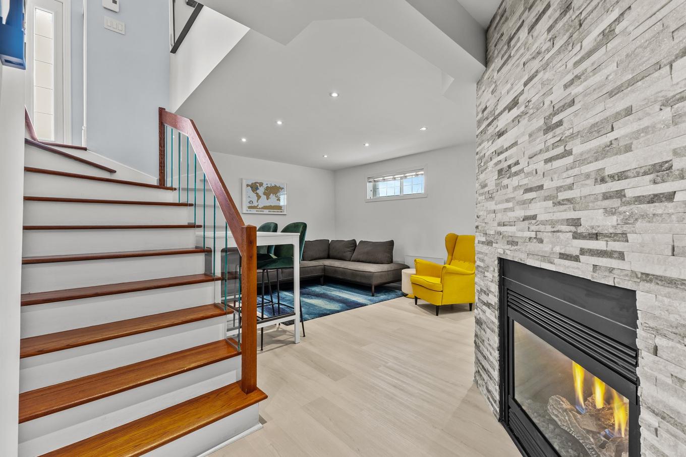 Basement - 80 Rue Des Tourterelles, La Prairie, QC - Indoor With Fireplace