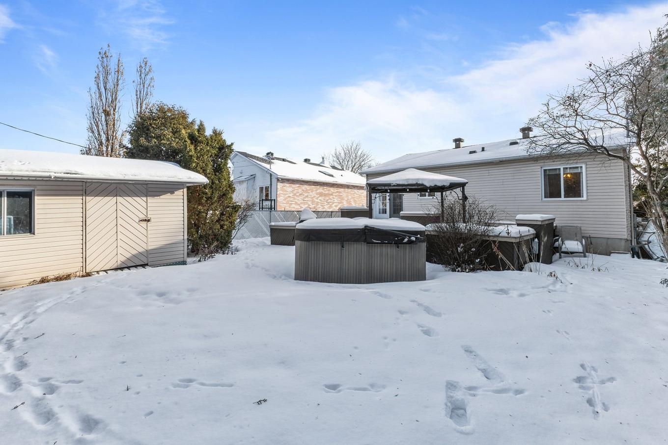 Backyard - 80 Rue Des Tourterelles, La Prairie, QC - Outdoor With Exterior