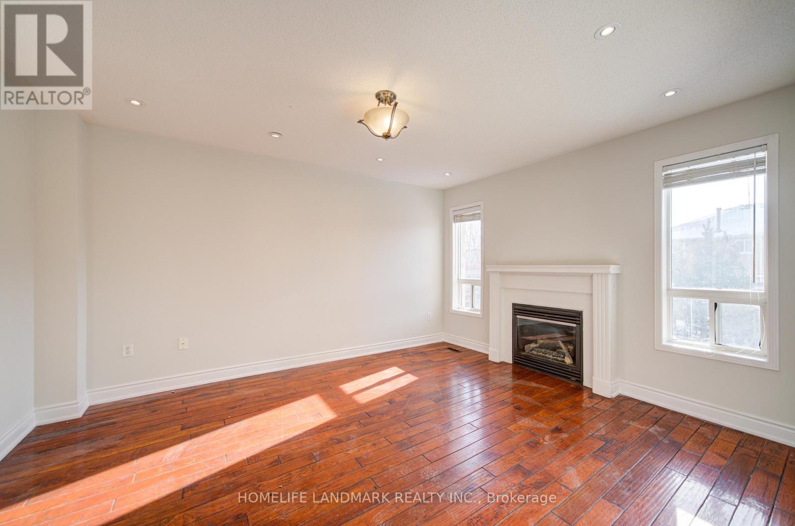4719 Apple Blossom Circle, Mississauga, ON - Indoor Photo Showing Living Room With Fireplace