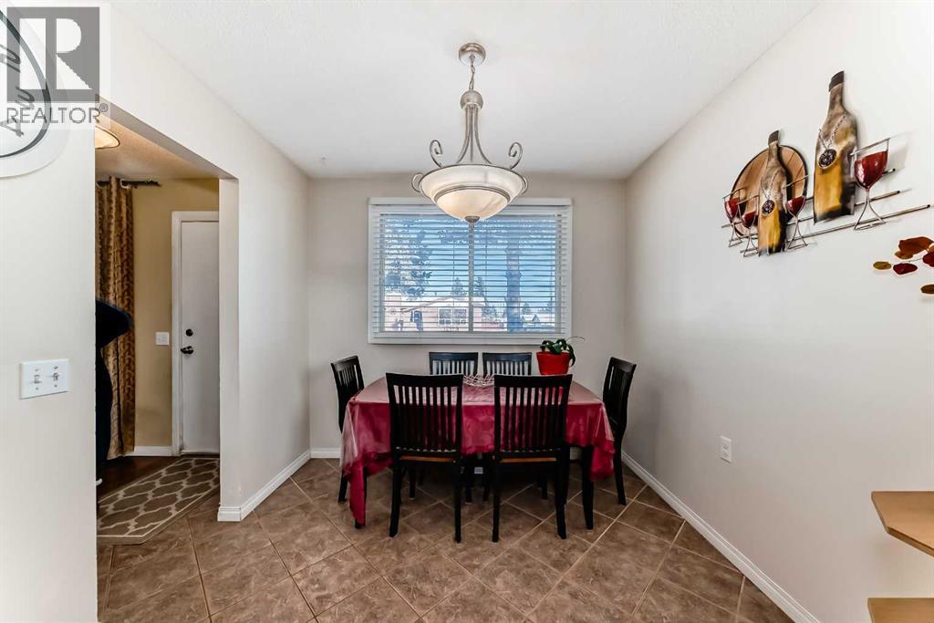 208 Bracewood Road Sw, Calgary, AB - Indoor Photo Showing Dining Room
