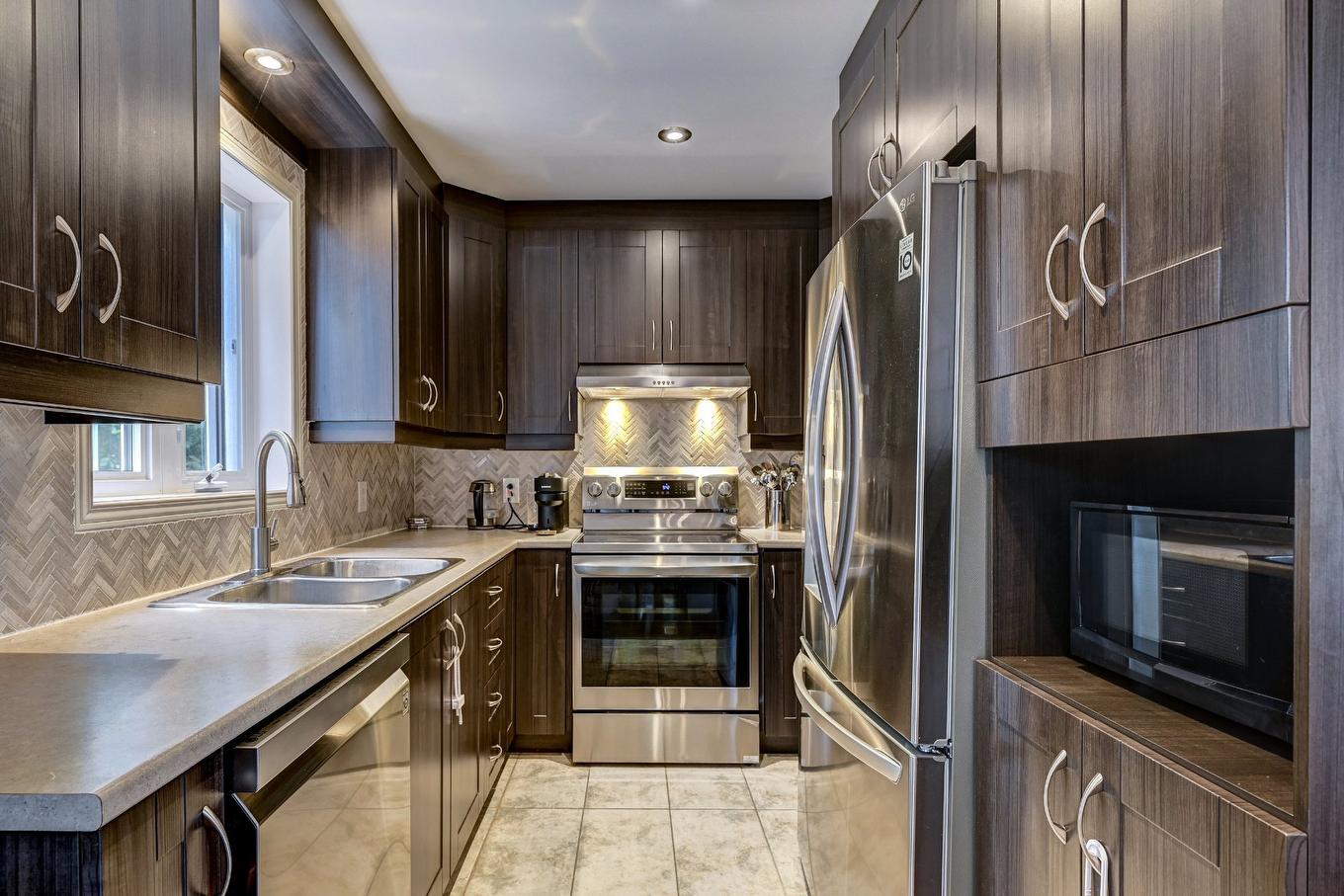 Kitchen - 51 Rue Sicard, Laval (Auteuil), QC - Indoor Photo Showing Kitchen With Double Sink
