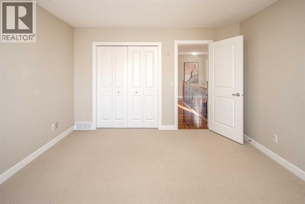 135 Everglade Circle Sw, Calgary, AB - Indoor Photo Showing Other Room