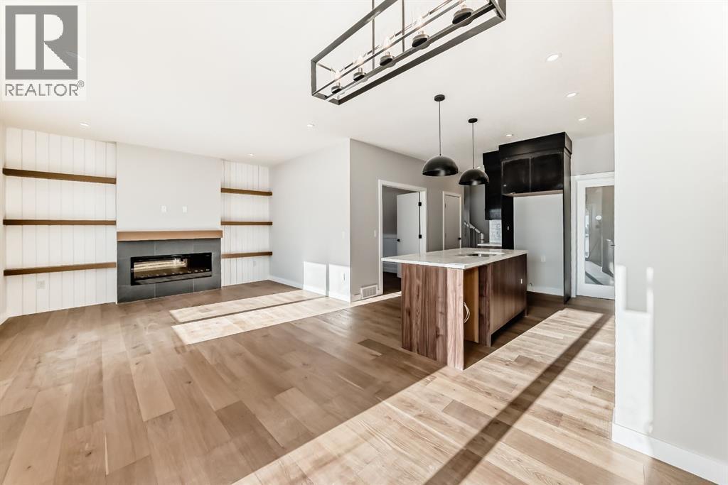 504 Heritage Boulevard, Cochrane, AB - Indoor With Fireplace